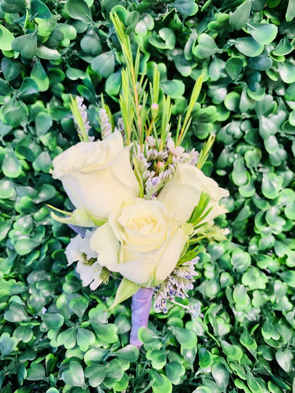 White Spray Rose Boutonniere — Alabaster Florist